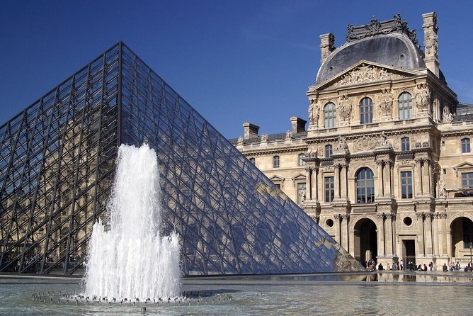 Guided Luxury Paris Day Trip with Optional Lunch at the Eiffel Tower - Louvre Museum: a quick photo stop, not a full museum day