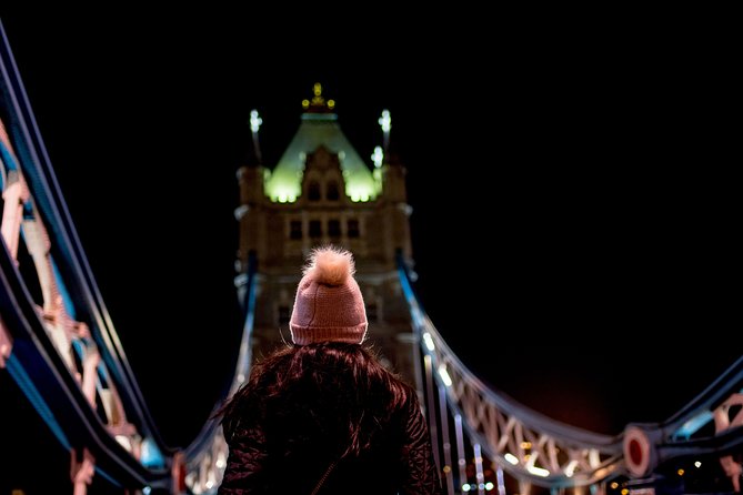 London by Night Bus Tour with Christmas Lights and Live Guide - Piccadilly Circus: billboards on, night lights on, guide keeping pace