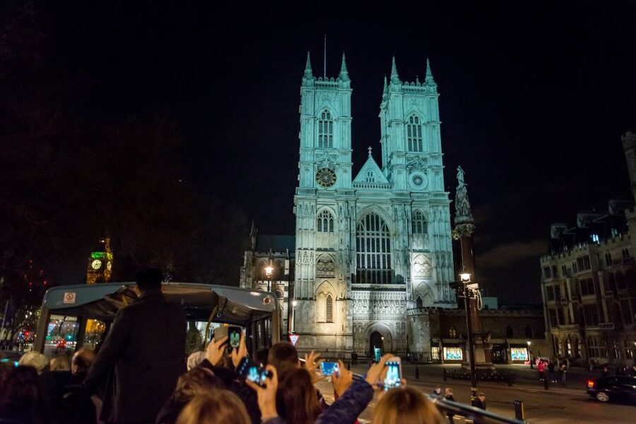 London: Nighttime Open-Top Bus Sightseeing Tour - You Get Two Layers of Storytelling: Live Guide Plus 12-Language Audio