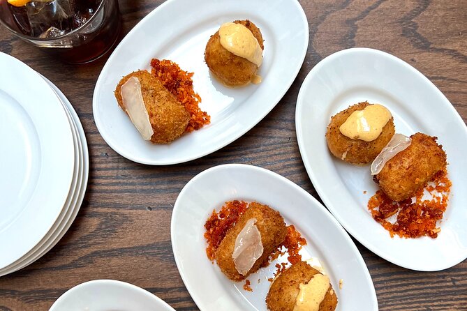 London Soho Food Tour with 7+ Tastings of Delicious Hidden Gems - Stop 3, 17-19 Great Windmill St: WWII-era entertainment history