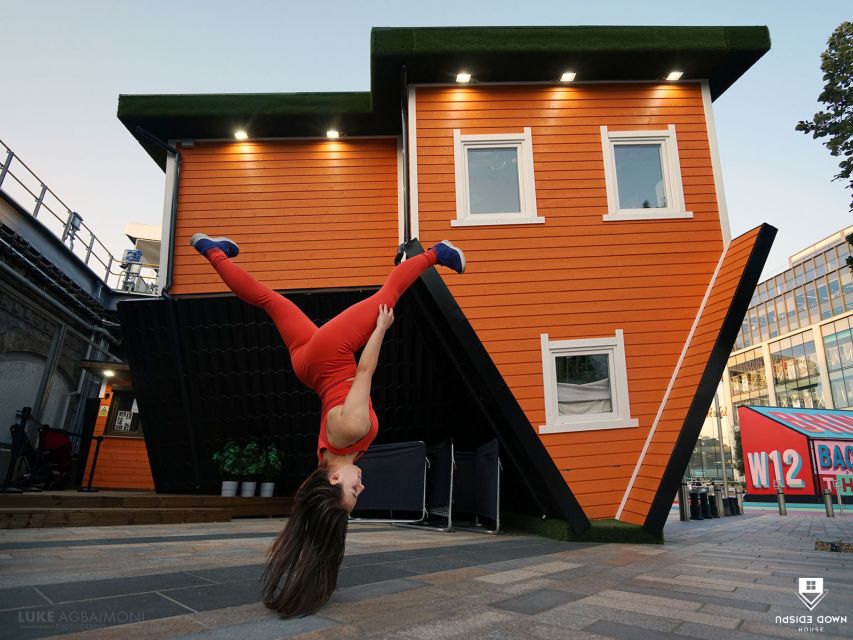 London: Upside Down House Westfield White City Entry Ticket - Walking on the ceiling, reaching for the coffee table, and making the best poses