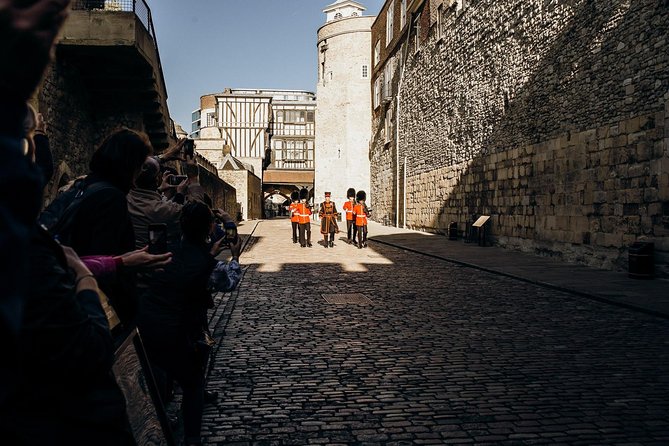 VIP Early Access Opening Ceremony Tower of London & River Cruise - Group size, earpieces, and pacing through narrow Tower spaces